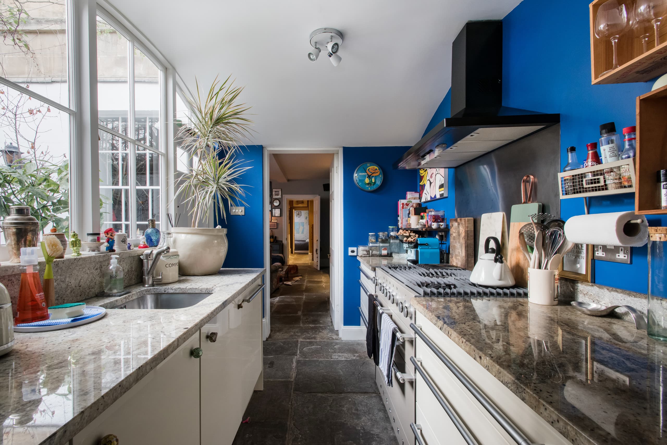 The blue and white kitchen overlooking the courtyard